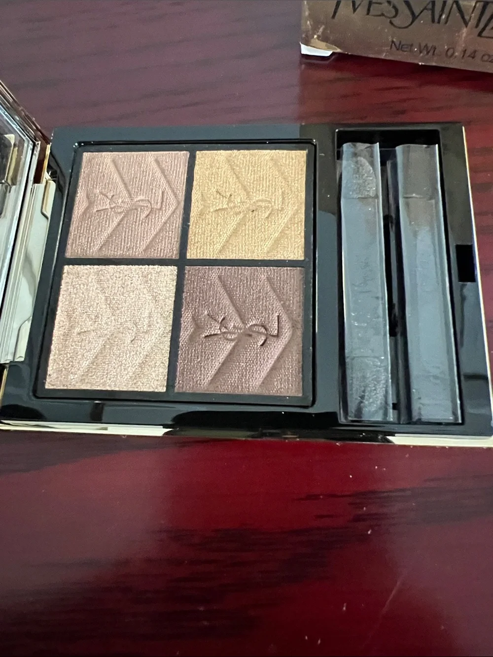 Yves Saint Laurent compact four